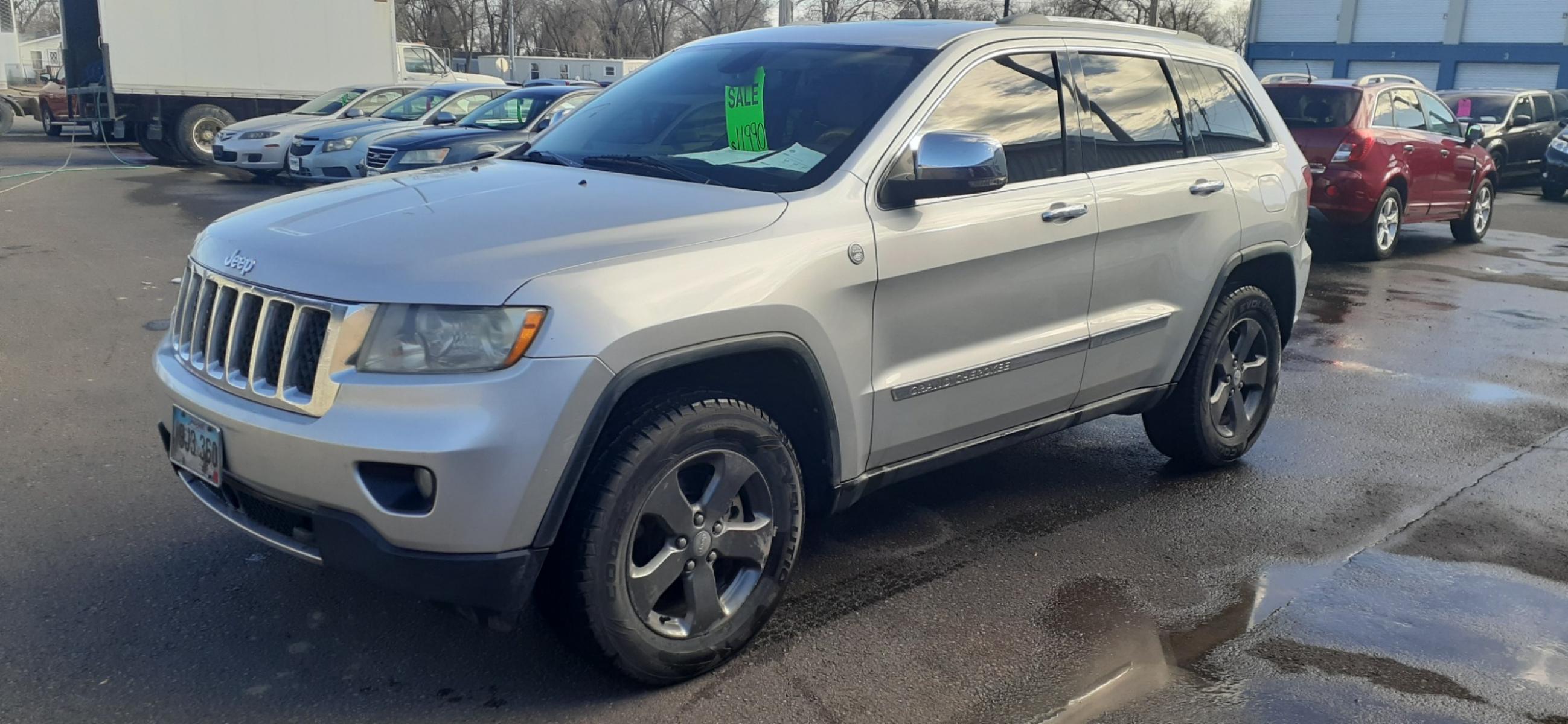 2011 Jeep Grand Cherokee (1J4RR6GT0BC) with an 5.7 Hemi engine, 5-Speed Automatic transmission, located at 2015 Cambell Street, Rapid City, SD, 57701, (605) 342-8326, 44.066433, -103.191772 - CARFAX AVAILABLE - Photo #5